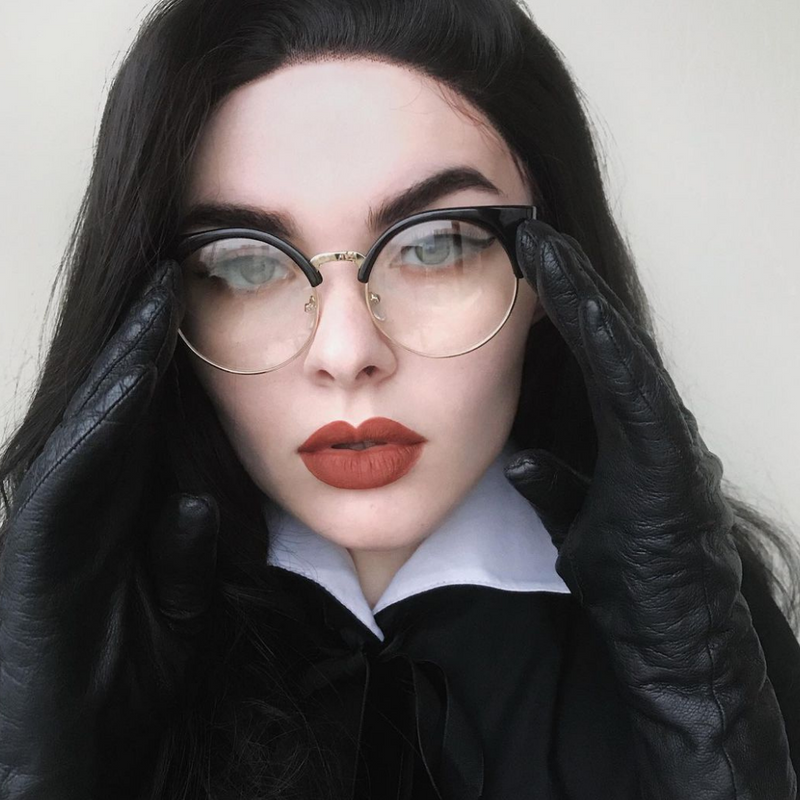 Gafas de media montura con lentes transparentes y ojo de gato redondas Indie Hipster 9351